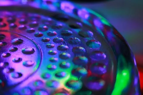 Abstract background of a glass jar with a pattern of green and blue lights Stock Photos