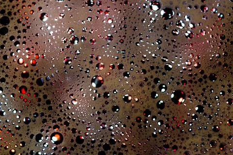 Abstract background with glitter. Colored soap foam texture. Foam with bubble Foto stock