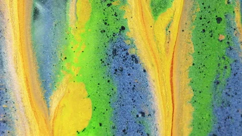 Abstract background glitter dye yellow green blue Video stock 264963742