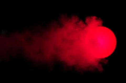 Abstract background, glowing burning red ball with clouds and smoke on black Stock Illustration