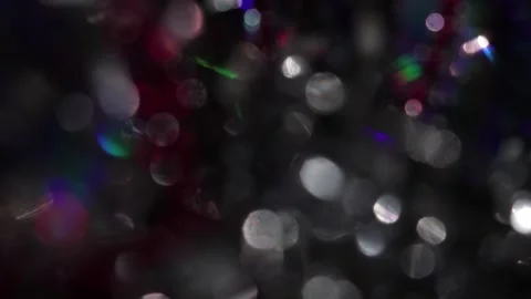 Abstract background of glowing colored bokeh lights with slow motion upwards. Vídeos de archivo 318576147