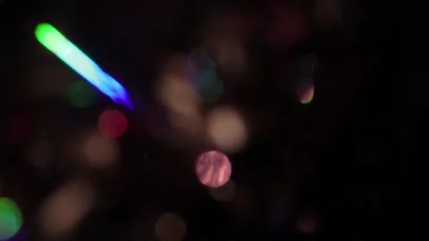 Abstract background of glowing colored bokeh lights with slow motion upwards. 스톡 동영상 318577075