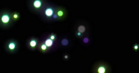 Abstract background of glowing shiny moving blurry bokeh particles. blend mode Stock Footage 166323221