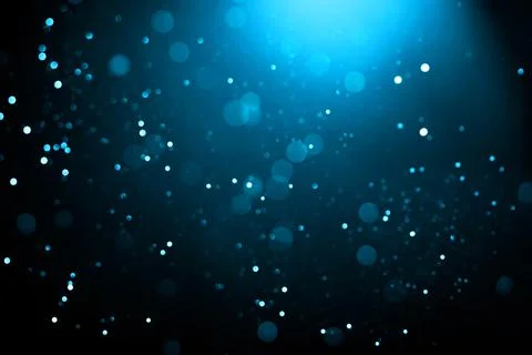 Abstract background with glowing turquoise particles. Stock Illustration