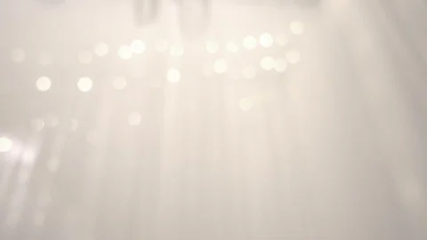 Abstract background goes through a soft white fabric with a light bokeh gently Video stock 89679612