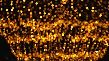 Abstract background of gold bokeh lights. Panning from bottom to top Stock Footage 85483268