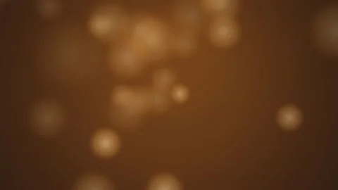 Abstract background with golden bokeh light particles moving and fading slo.. Видео 341285715