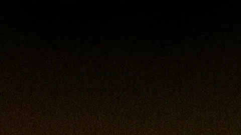 Abstract background with golden flickering particles on dark background Stock Footage 281789624