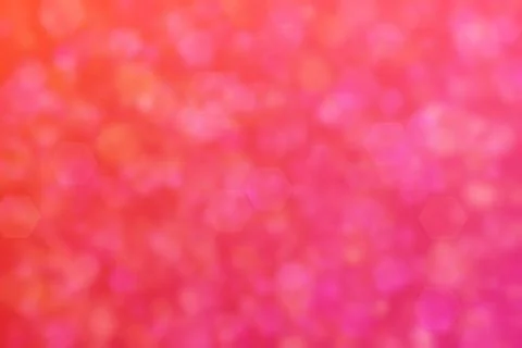 Abstract background with gradient from orange to pink and hexagon shaped rand Stock Photos
