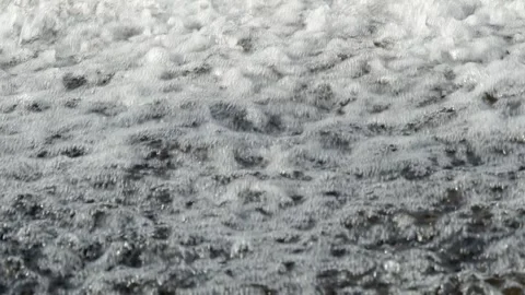 Abstract background, Graphic elements, Bubbling water flows quickly over a weir, Stock Footage 298081913
