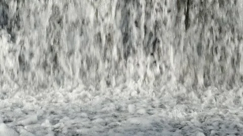 Abstract background, Graphic elements, Bubbling water flows quickly over a weir, Stock Footage 298082305