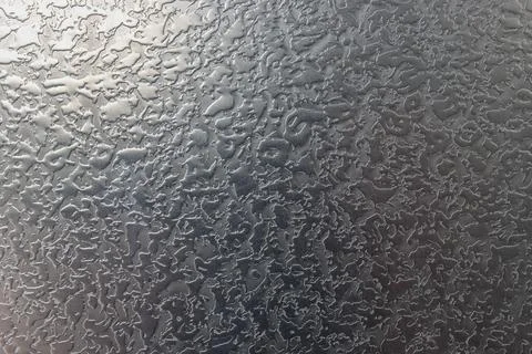Abstract background of a gray metal surface. Stock Photos