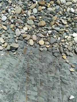 Abstract background gray Sandstone, small pebbles, sea pebbles, stone gray su Stock Photos