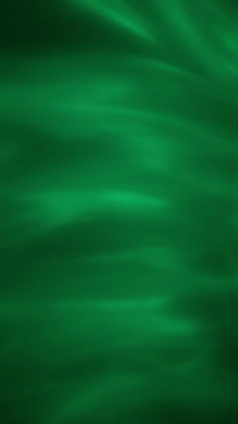 Abstract background of green wavy soft pattern. Slow motion. Vertical Format Stock Footage 319808349