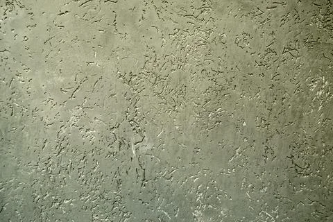 Abstract background of a grey wall with patterns and cracks Stock-Fotos