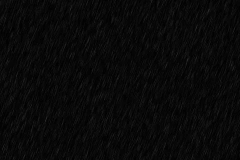Abstract background of heavy rain falling at night. Perfect for overlay or .. Stock Photos