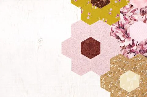 Abstract background of hexagonal pieces of fabric Grandmother's Flower Gard.. Stock-Fotos