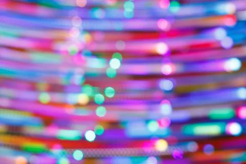 Abstract background of horizontally glowing objects out of focus Foto stock