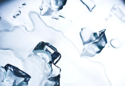 Abstract background with ice cubes over wet glass Stock Photos