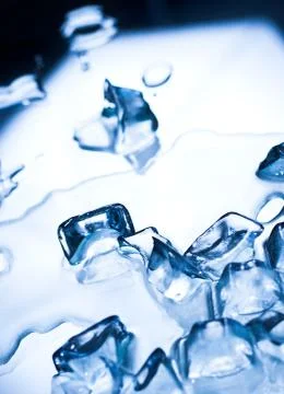 Abstract background with ice cubes over wet glass Stock Photos