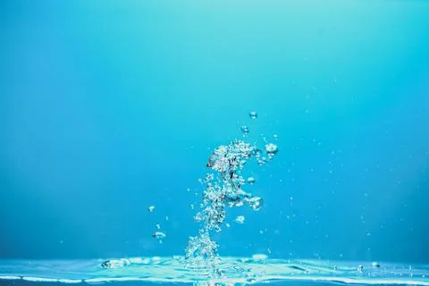 Abstract background image of bubbles in blue water. Stock Photos