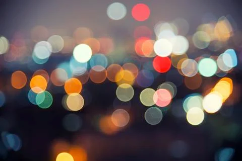 Abstract background image of circular bokeh motion blurred street light backg Stock Photos