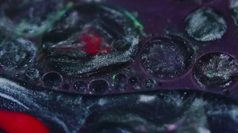 Abstract background ink floating metallic purple Video stock 260793394
