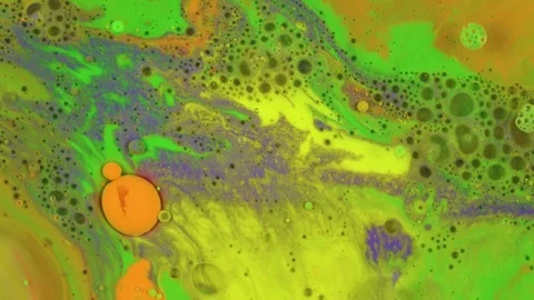 Abstract background ink liquid paints mixing surface. Bright colors. Video stock 82972084