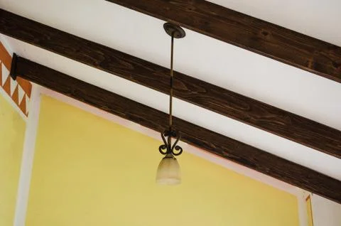 Abstract background of the interior of an old hotel from the ceiling of a cor Stock Photos