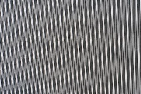 Abstract background of intersecting metal lines in industrial style Stock Photos