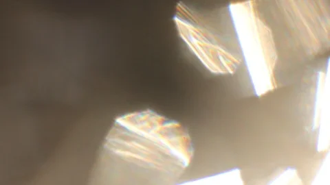 Abstract background - light color flashes and rays on black. Lens flare. Stock Footage 101044873