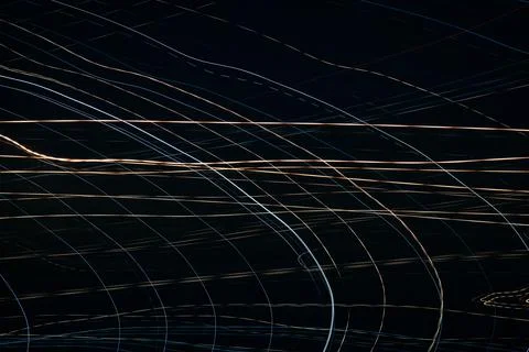 Abstract background of light trails on long exposure shot Stock Photos