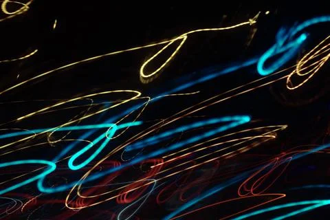 Abstract background of light trails at night Stock Photos