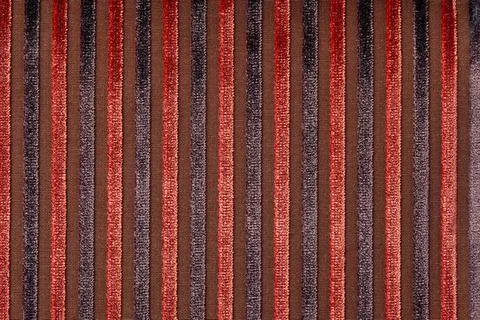 Abstract background with lines pattern, Velvet dark red fabric surface, stripes Stock Photos