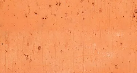 Abstract background of a longitudinal section of orange clay bricks with a Stock Photos