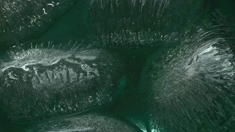 Abstract Background Macro Shot With Ice Cubes In A Soda Tonic Fizzy Water Stock Footage 121102190