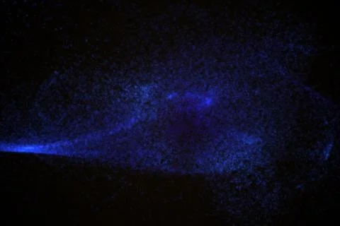 Abstract background made of blue glowing particles Stock Illustration