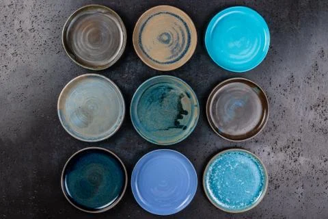 Abstract background made of decorative empty round ceramic dishes different c Stock-Fotos