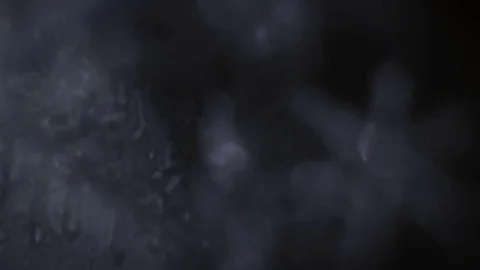 Abstract background maked by rack focus thru the snow in microscope Stock-Footage 73005556