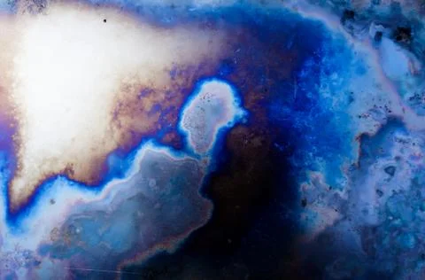 Abstract background of a metal surface after exposure to temperature Stock Photos
