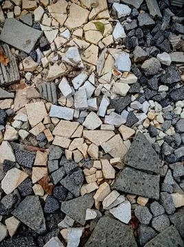 Abstract background of a mixture of yellow and gray rocks Stock Photos