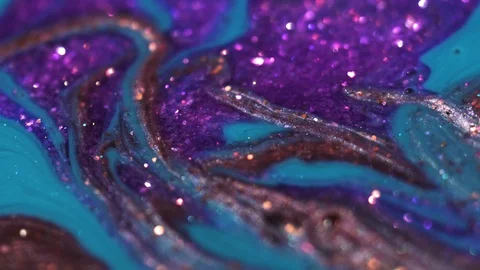 Abstract background from multi-colored moving liquid paints. Macro shooting Видео 124409762