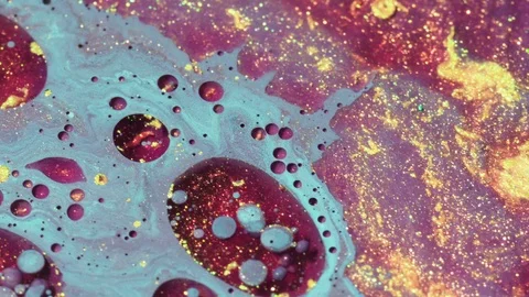 Abstract background from multi-colored moving liquid paints. Macro shooting Stock-Footage 125039338