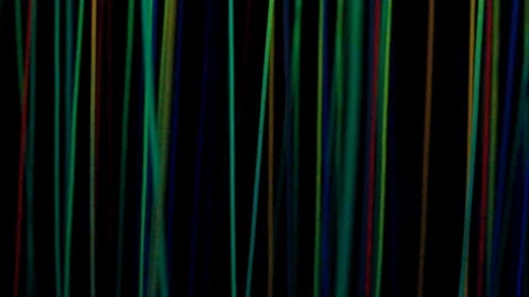 Abstract background. multicolored moving stripes against a dark background Stock Footage 123302267