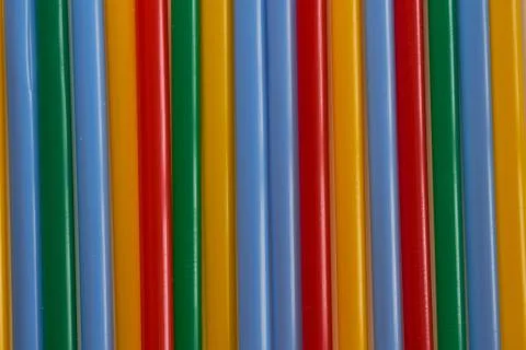Abstract Background Multicolored Plastic Drinks Tubes. Close-up. Stock Photos