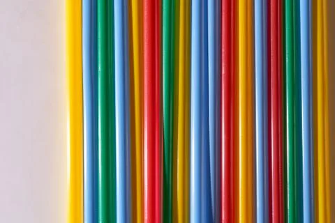Abstract Background Multicolored Plastic Drinks Tubes. Close-up. Stock Photos