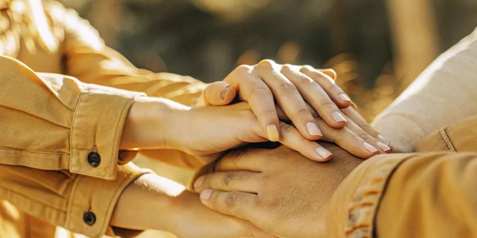 Abstract background. Multiple hands overlapping in concept of unity in teamwork Stock Photos