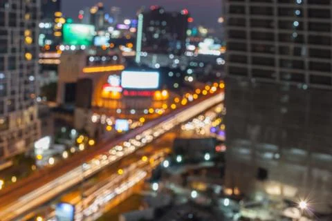 Abstract background of the night light trails with the modern building and tr Stock-Fotos