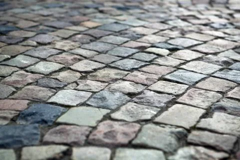 Abstract background of old cobblestone pavement Stock Photos