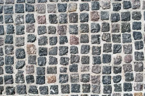 Abstract background of old cobblestone pavement view from above Stock Photos